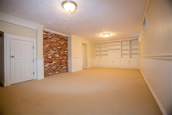25 Oxbow Road Wellesley, MA 02481 - Photo 10 of 14 an empty room with a empty space and windows
