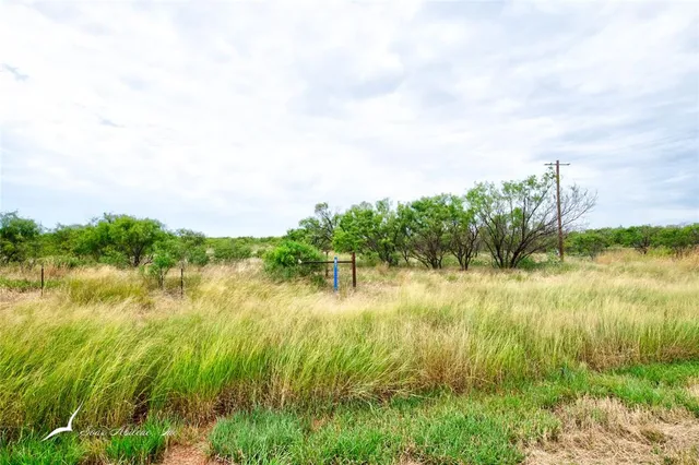 a view of lake with green space