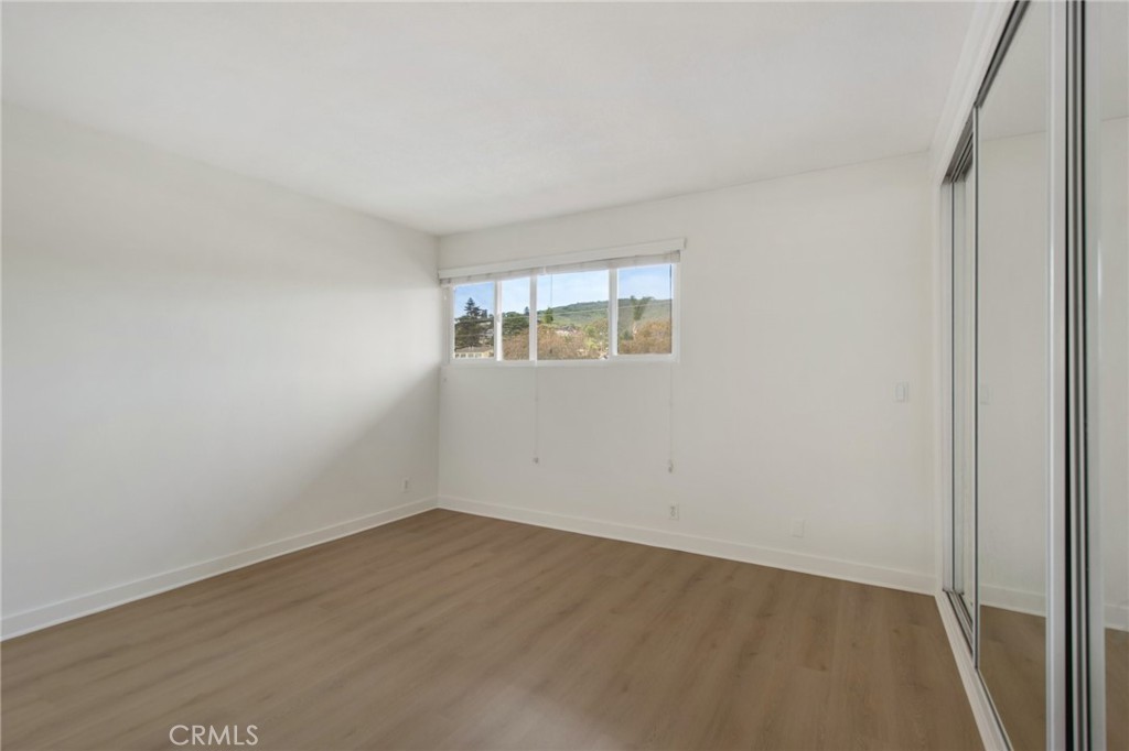 330 Cliff Drive, Unit 308 Laguna Beach, CA 92651 - Photo 14 of 16 an empty room with a window
