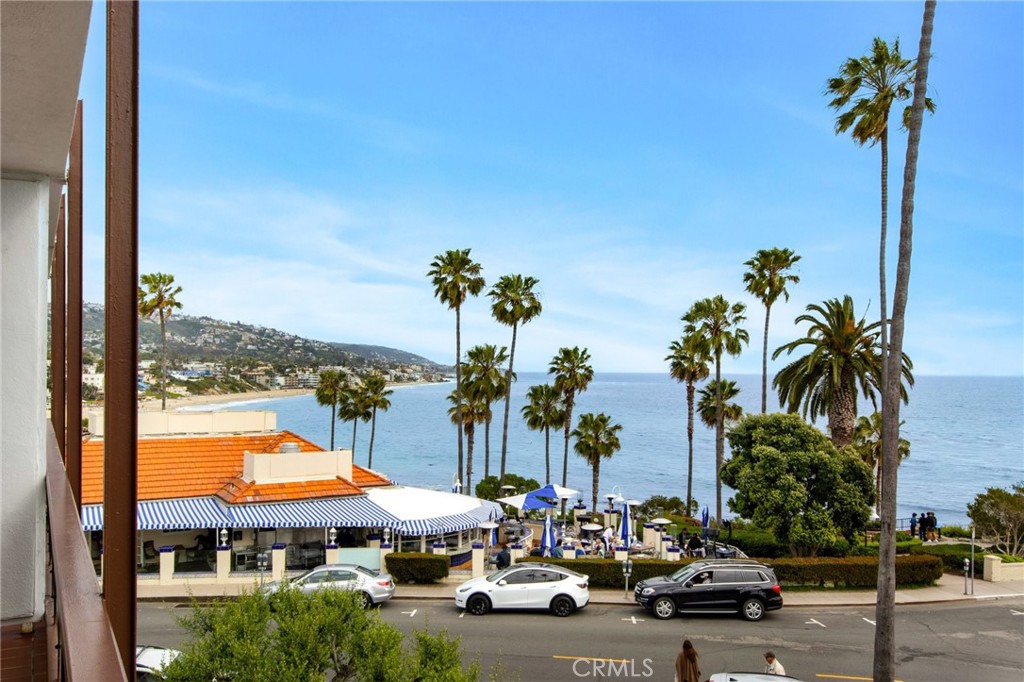 330 Cliff Drive, Unit 308 Laguna Beach, CA 92651 - Photo 4 of 16 a view of a city with palm trees