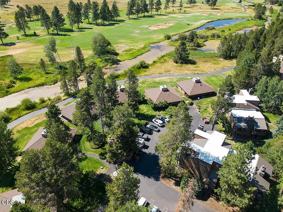 17654 Pinnacle Lane, Unit 16 Sunriver, OR 97707 - Photo 27 of 28 an aerial view of residential houses with outdoor space and lake view