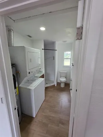 a view of utility room with a washer and dryer