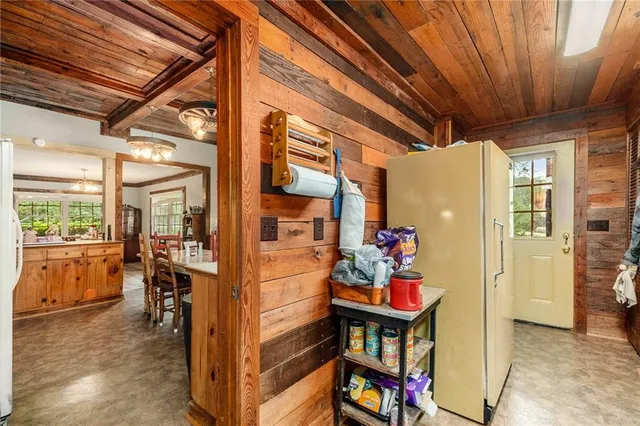 a room with furniture and large window