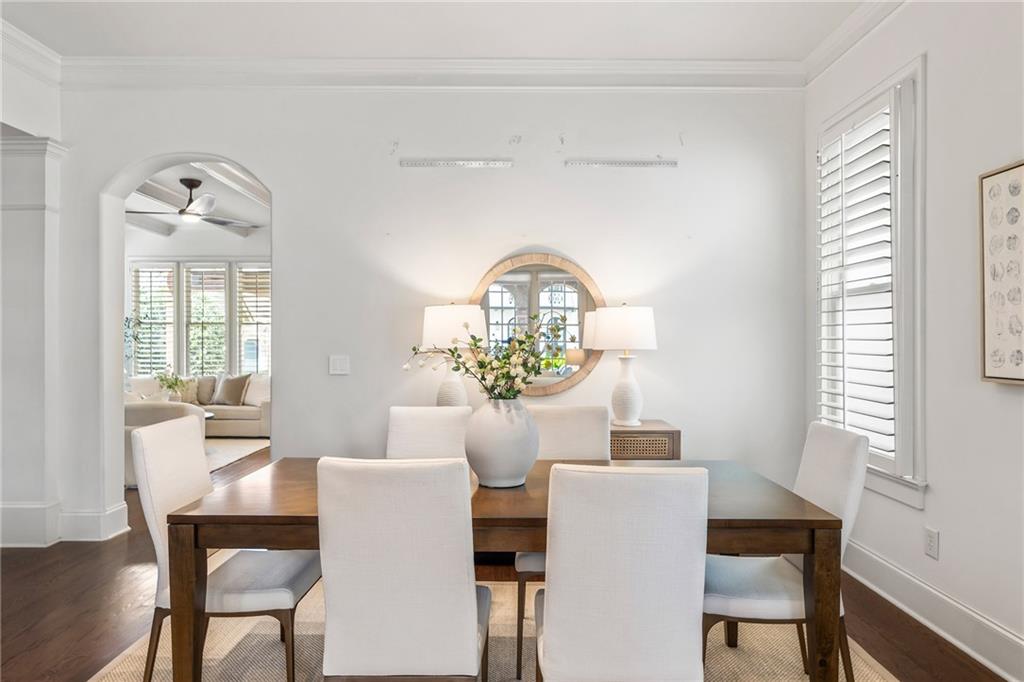 6645 Will Allen Road Cumming, GA 30040 - Photo 14 of 62 a view of a dining room with furniture and a window