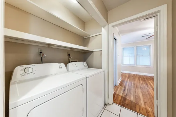 a utility room with dryer and washer
