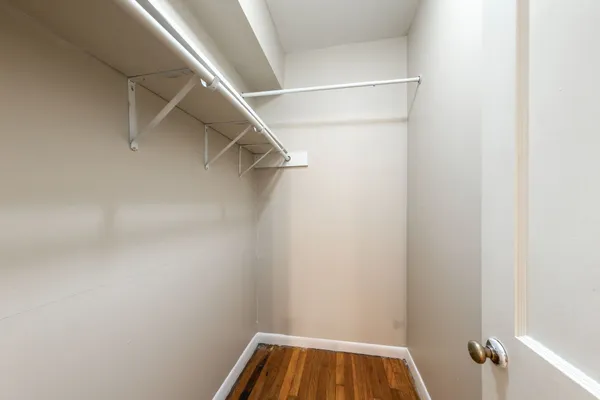 a view of a room with rack on the wall