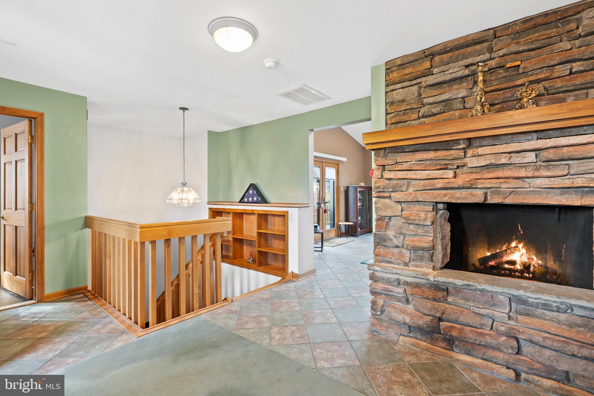 164 Trenton Road Langhorne, PA 19047 - Photo 12 of 51 a view of an empty room with wooden floor fireplace and a window
