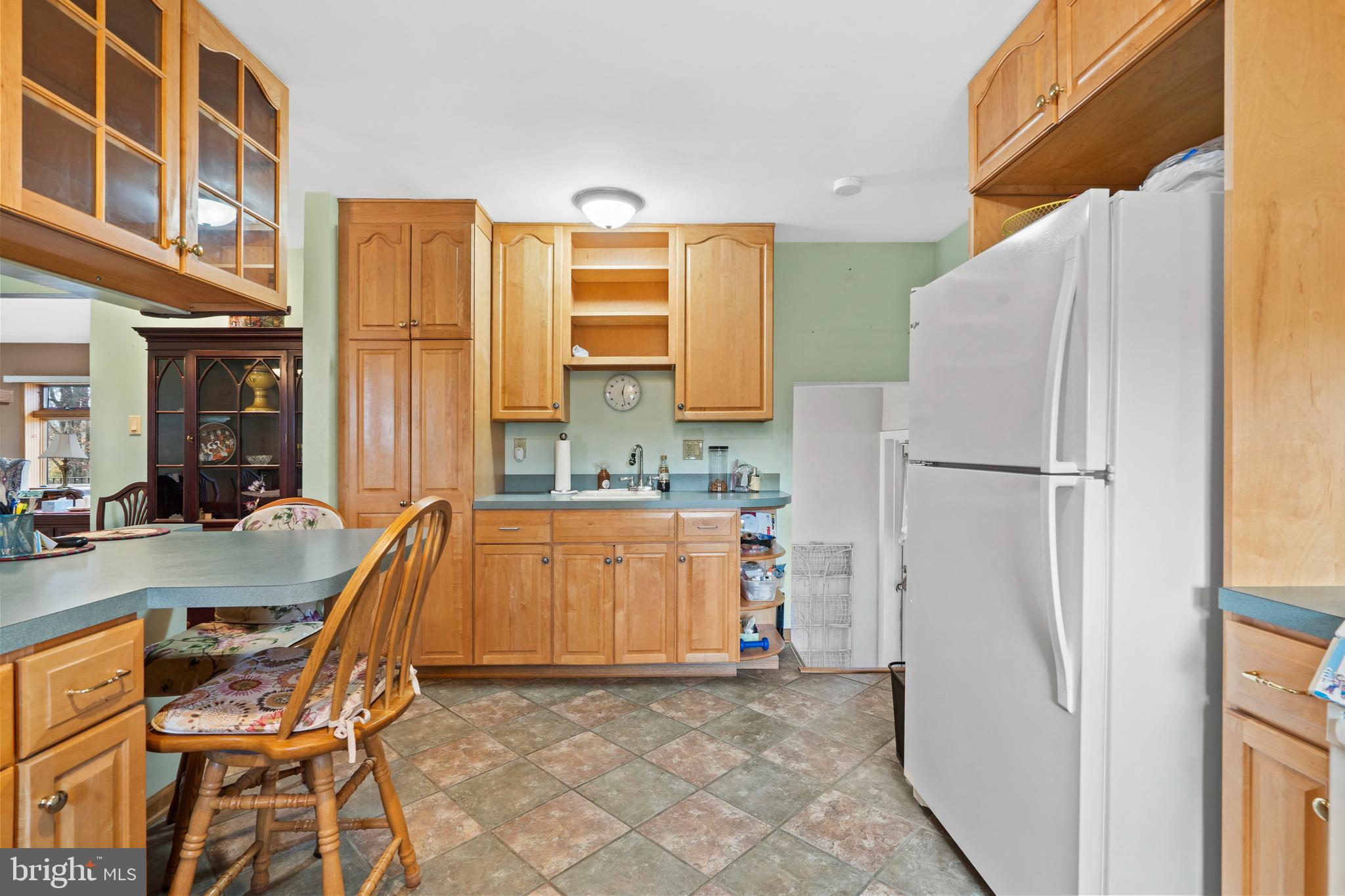 164 Trenton Road Langhorne, PA 19047 - Photo 17 of 51 a kitchen with a refrigerator and a sink