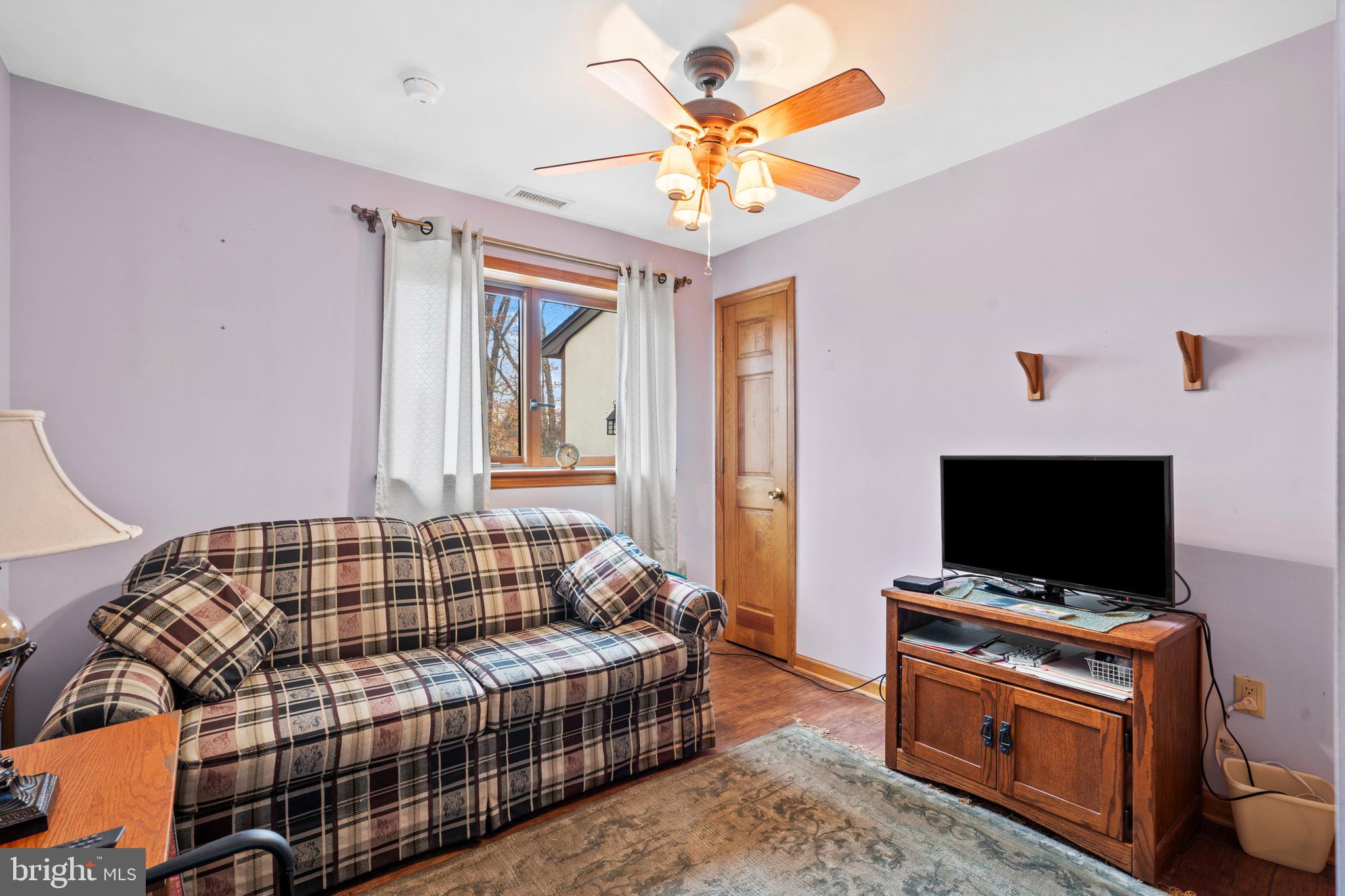 164 Trenton Road Langhorne, PA 19047 - Photo 19 of 51 a living room with furniture and a flat screen tv