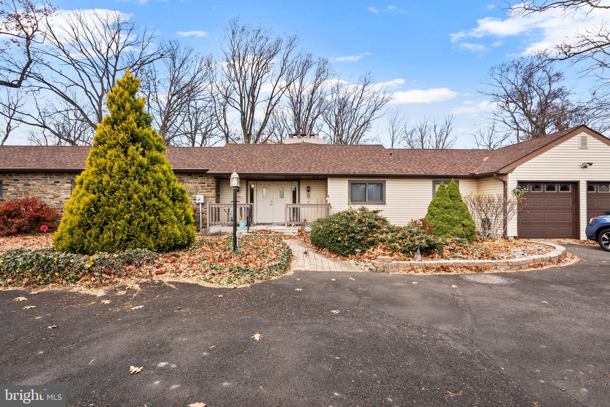 164 Trenton Road Langhorne, PA 19047 - Photo 2 of 51 a front view of a house with garden