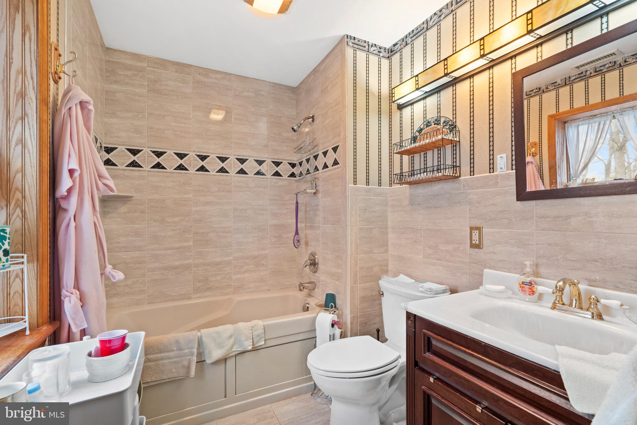 164 Trenton Road Langhorne, PA 19047 - Photo 24 of 51 a bathroom with a sink toilet and shower