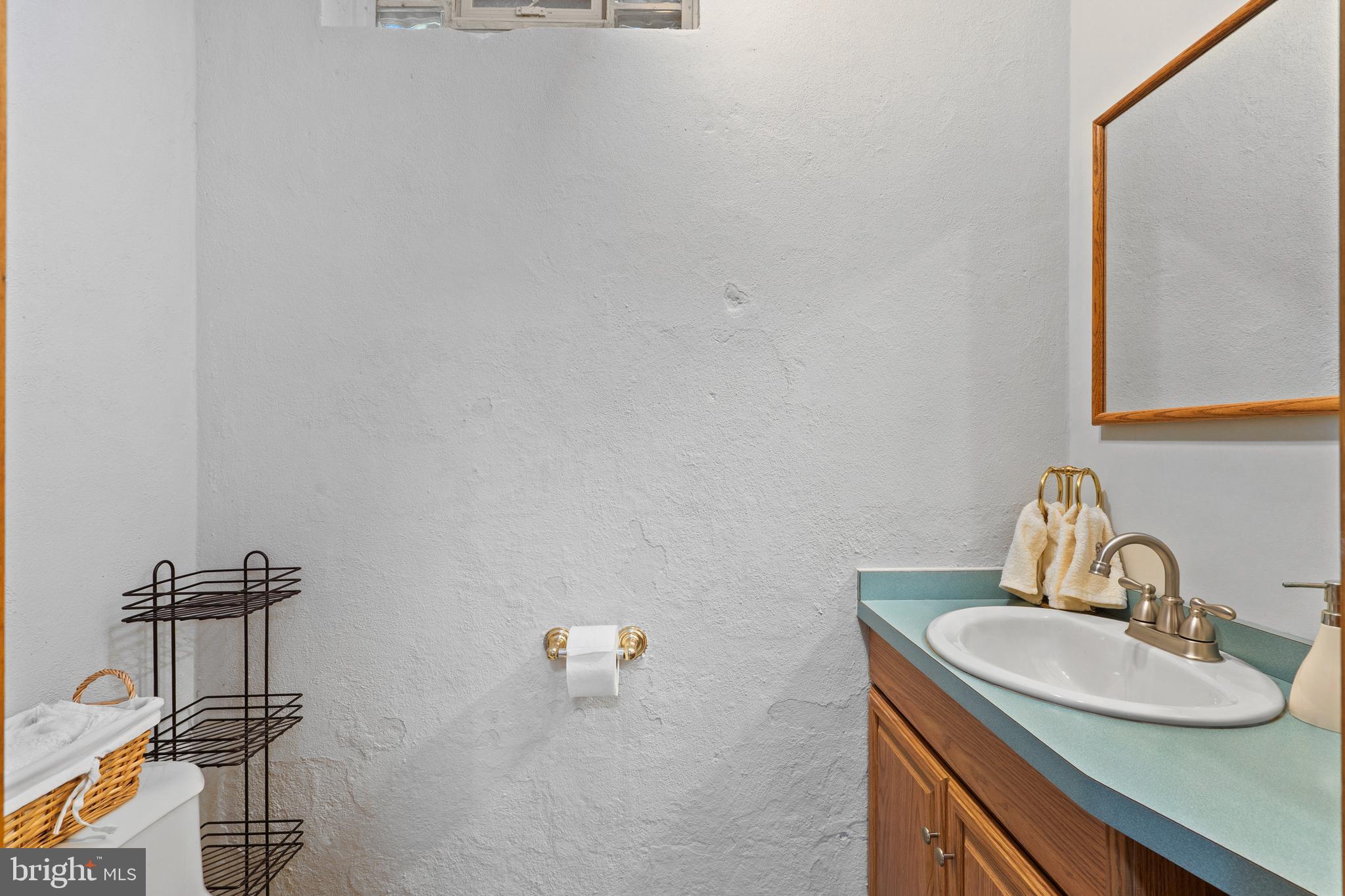 164 Trenton Road Langhorne, PA 19047 - Photo 27 of 51 a bathroom with a sink and a mirror