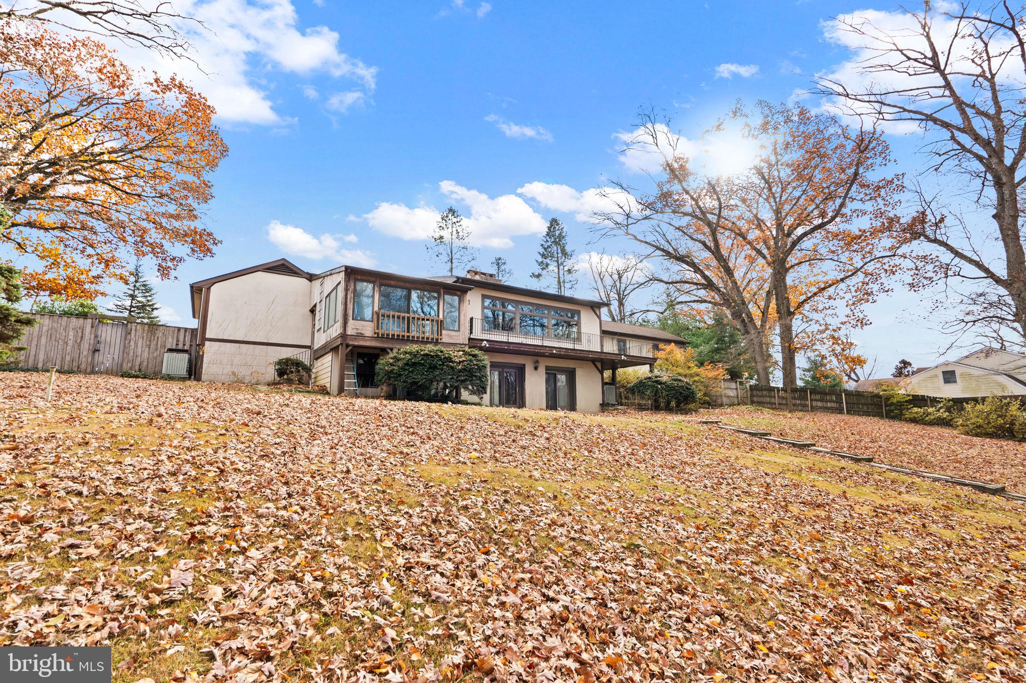 164 Trenton Road Langhorne, PA 19047 - Photo 5 of 51 a front view of a house with a yard covered with snow