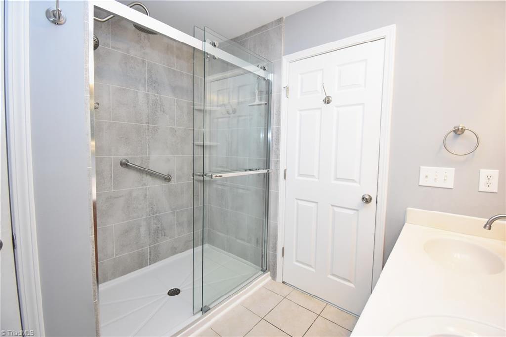 3910 Ribbon Grass Terrace Greensboro, NC 27405 - Photo 16 of 24 What a great shower for this stunner of a home.