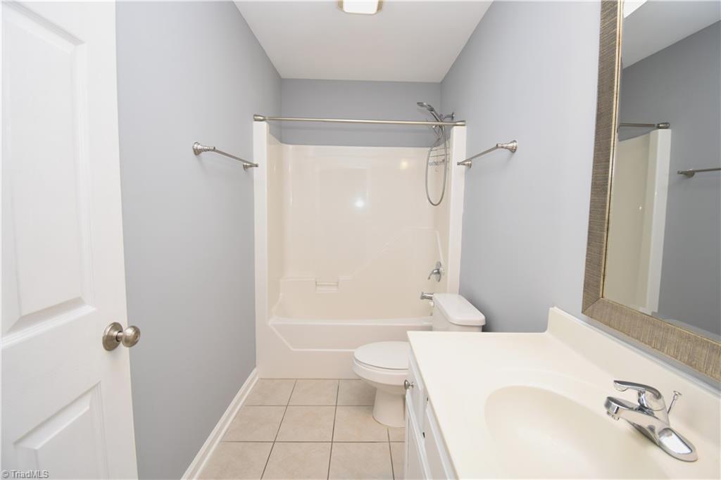 3910 Ribbon Grass Terrace Greensboro, NC 27405 - Photo 21 of 24 The main guest bathroom