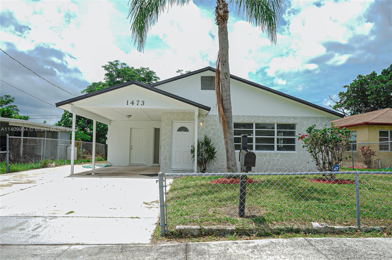 1473 West 35th Street Riviera Beach, FL 33404 - Photo 1 of 36 Gallery Image 1