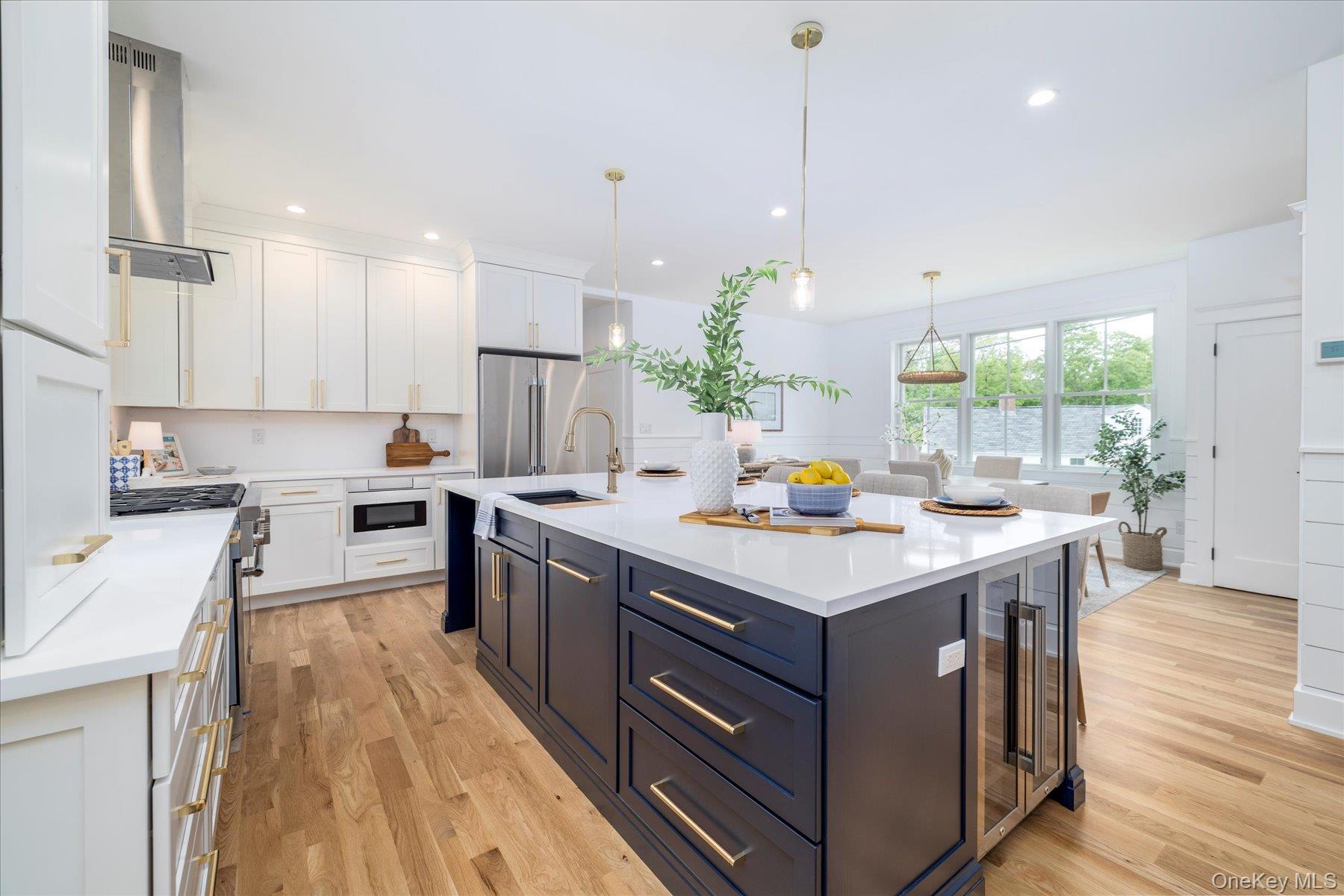 a kitchen that has a lot of cabinets in it