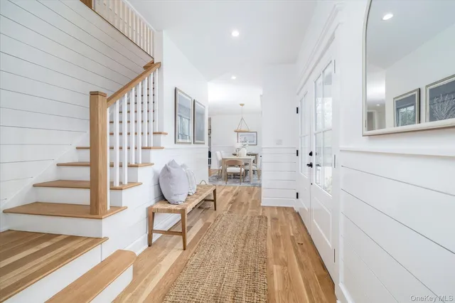 a view of a living room and entryway