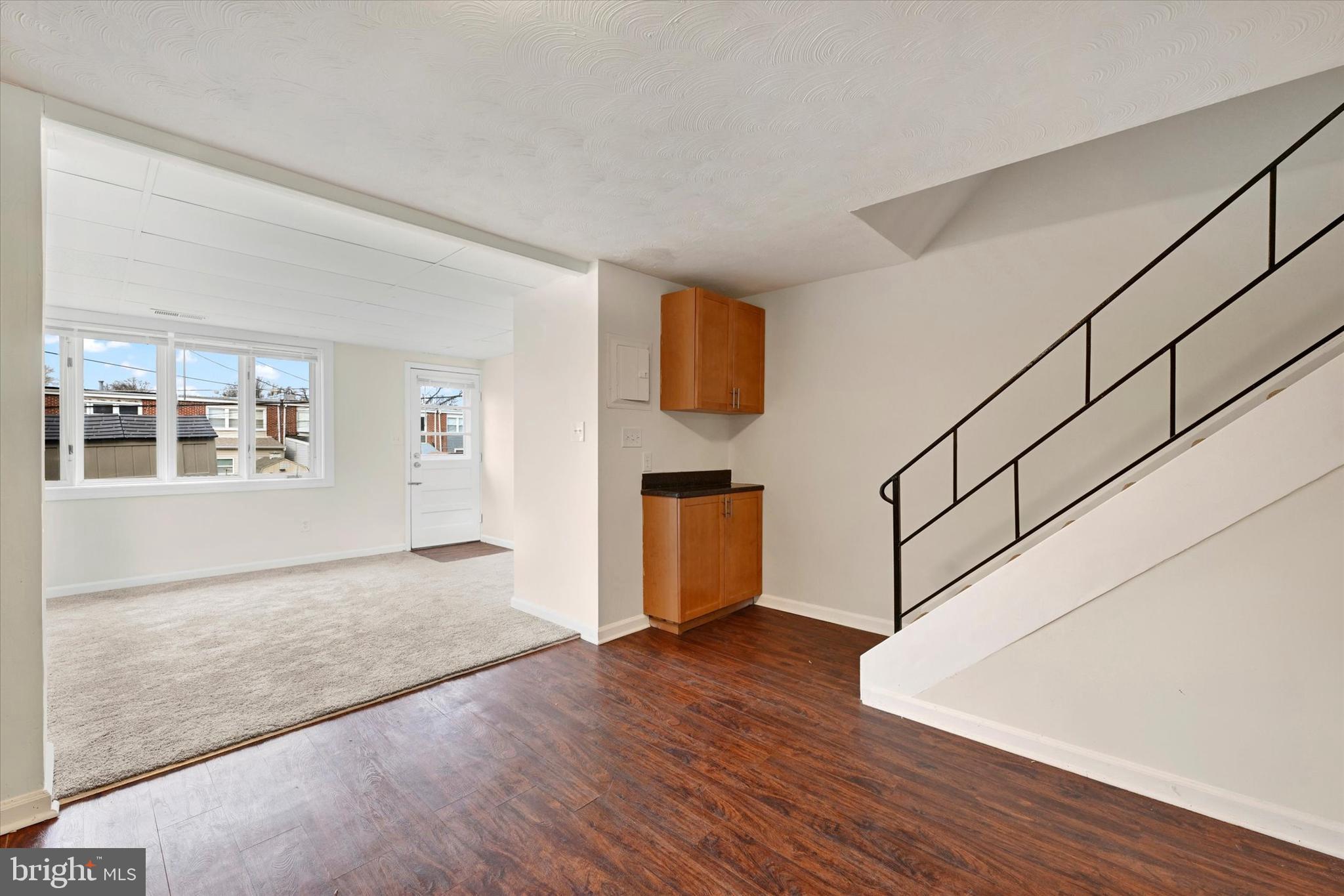 4436 Annapolis Road Halethorpe, MD 21227 - Photo 14 of 30 a view of empty room with wooden floor and fan