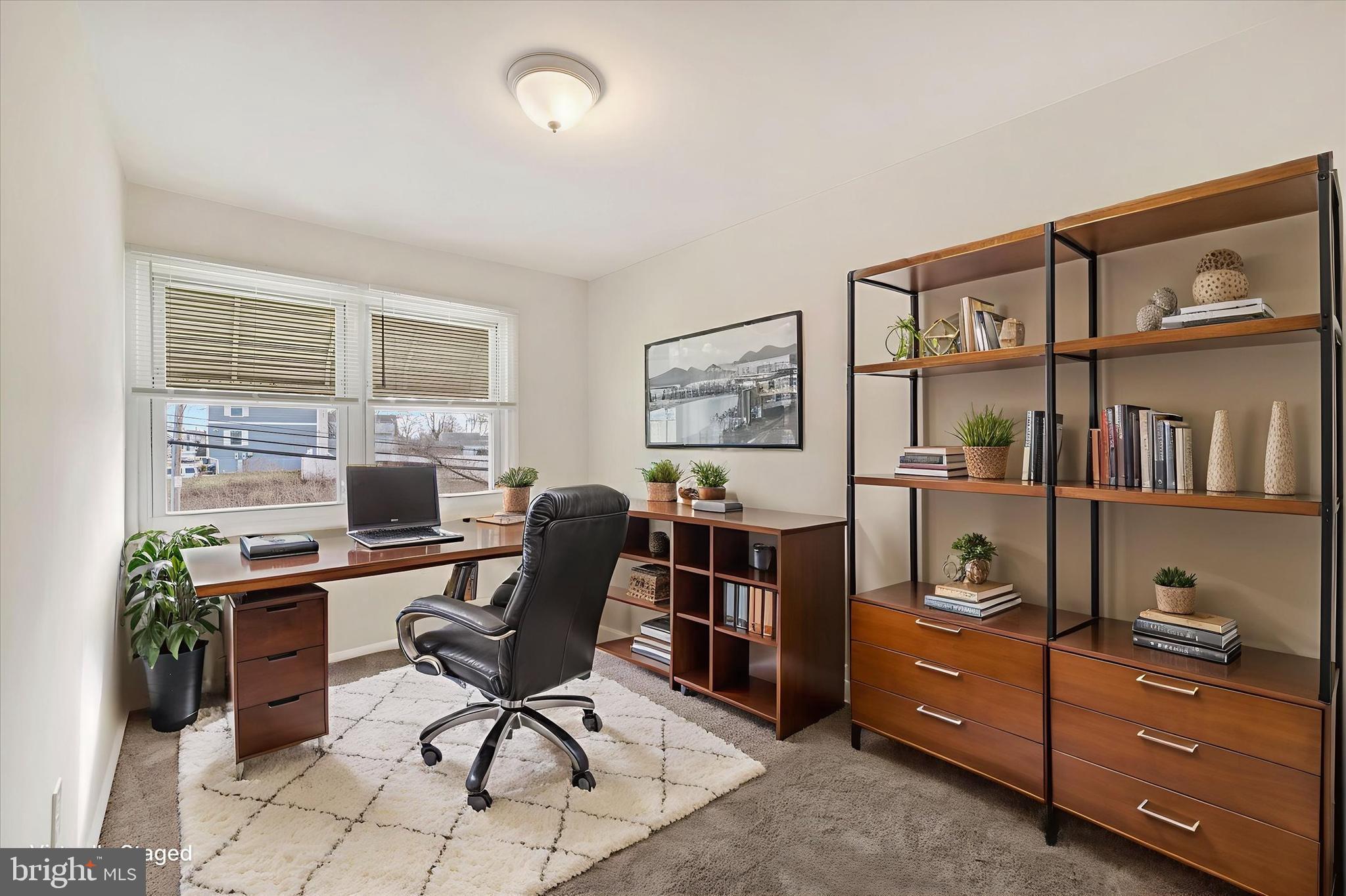 4436 Annapolis Road Halethorpe, MD 21227 - Photo 6 of 30 a view of a workspace with furniture and a window