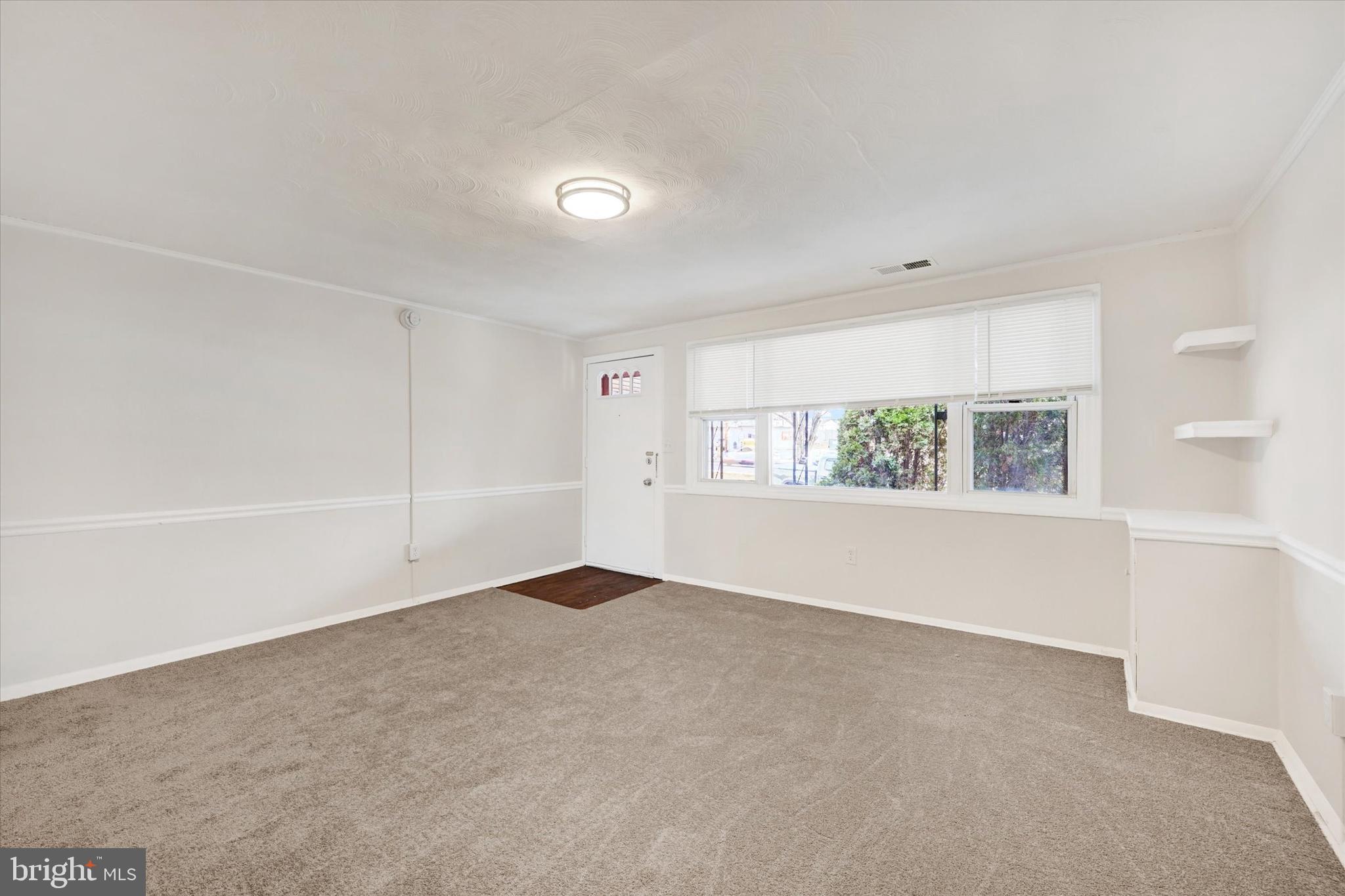 4436 Annapolis Road Halethorpe, MD 21227 - Photo 8 of 30 an empty room with windows