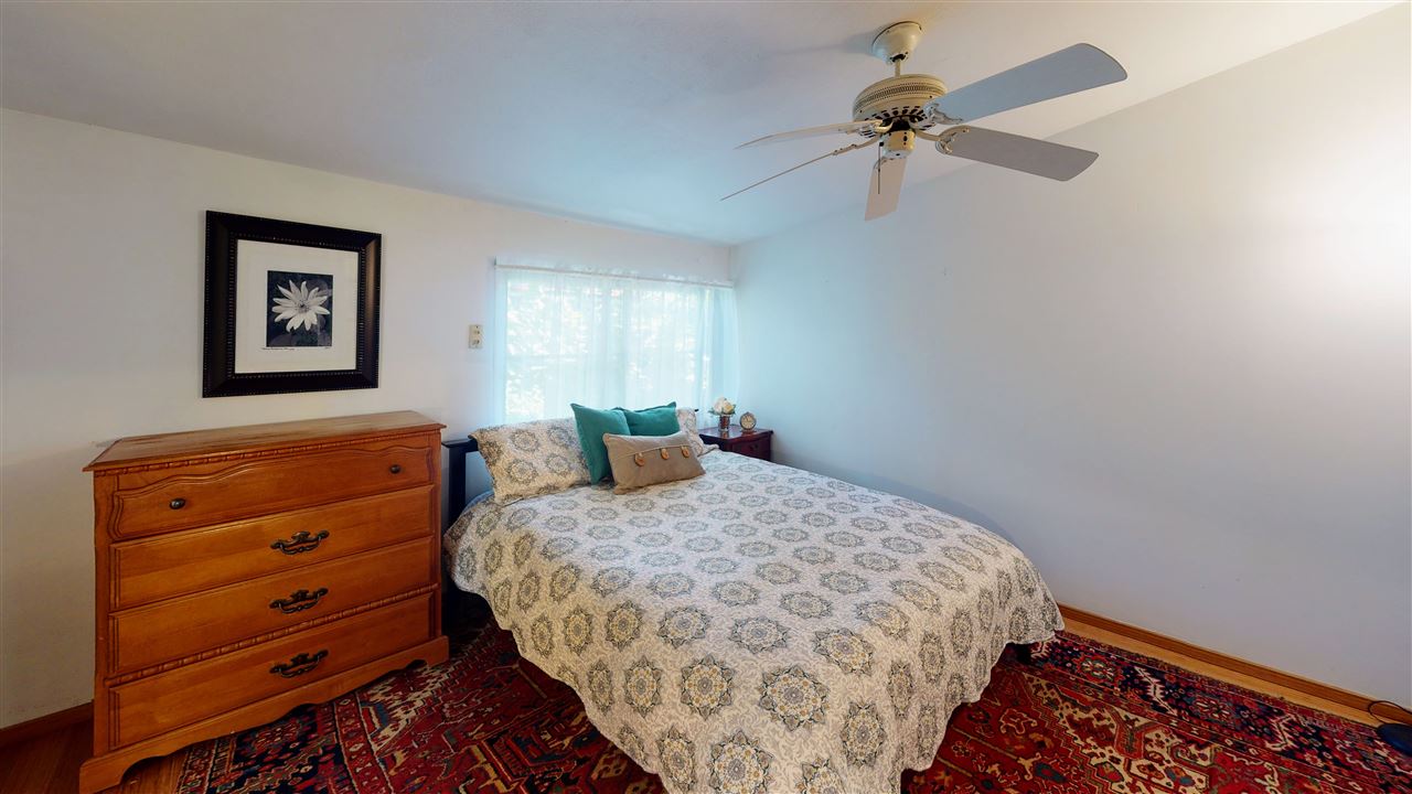 307 West Kuiaha Road Haiku, HI 96708 - Photo 13 of 30 a bedroom with a bed and a dresser