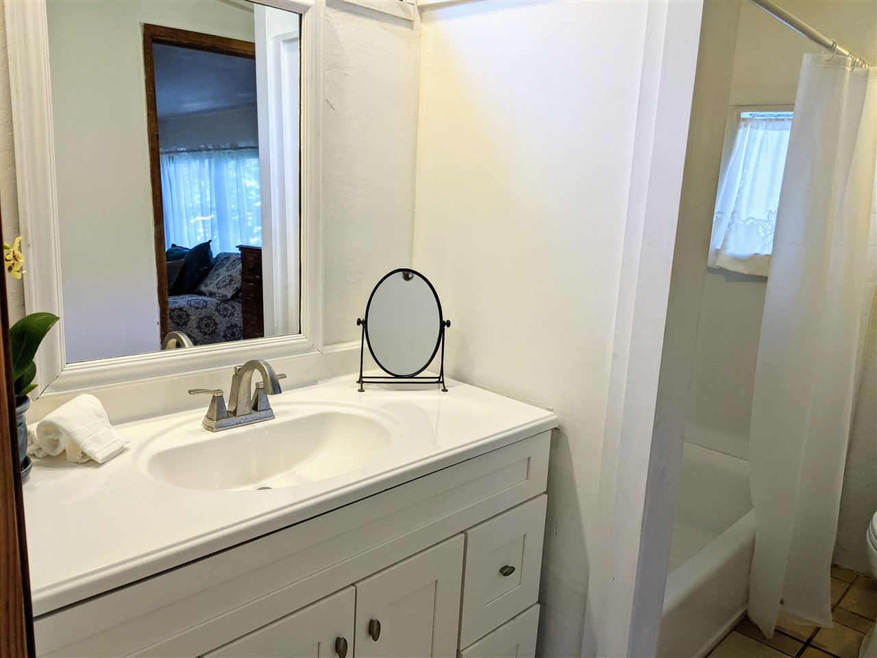 307 West Kuiaha Road Haiku, HI 96708 - Photo 15 of 30 a bathroom with a sink and a mirror