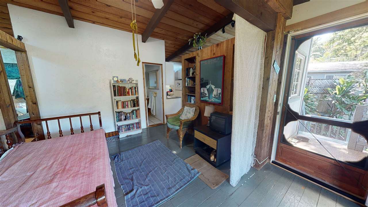 307 West Kuiaha Road Haiku, HI 96708 - Photo 20 of 30 a view of a bedroom with furniture and a window