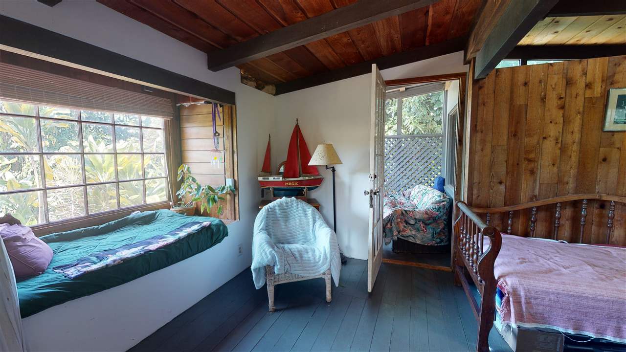 307 West Kuiaha Road Haiku, HI 96708 - Photo 21 of 30 a living room with furniture and a window