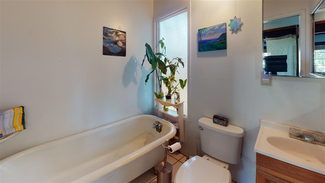 307 West Kuiaha Road Haiku, HI 96708 - Photo 25 of 30 a white bath tub sitting next to a white toilet