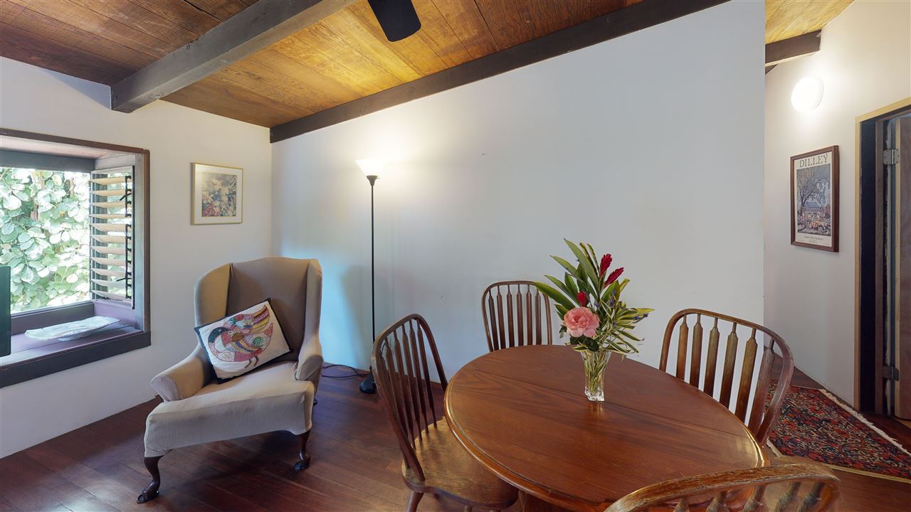 307 West Kuiaha Road Haiku, HI 96708 - Photo 6 of 30 a view of a dining room with furniture window and wooden floor