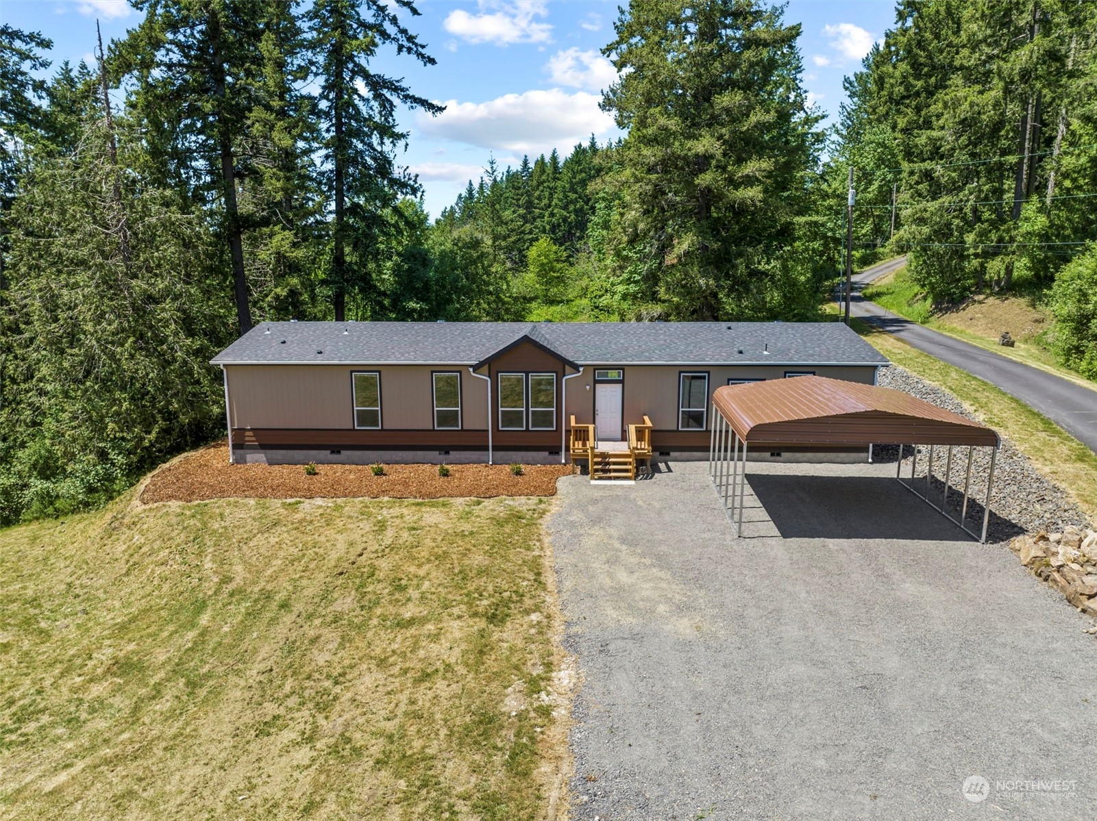 157-p G P G Sweet Road Kelso, WA 98626 - Photo 6 of 35 a front view of a house with a yard