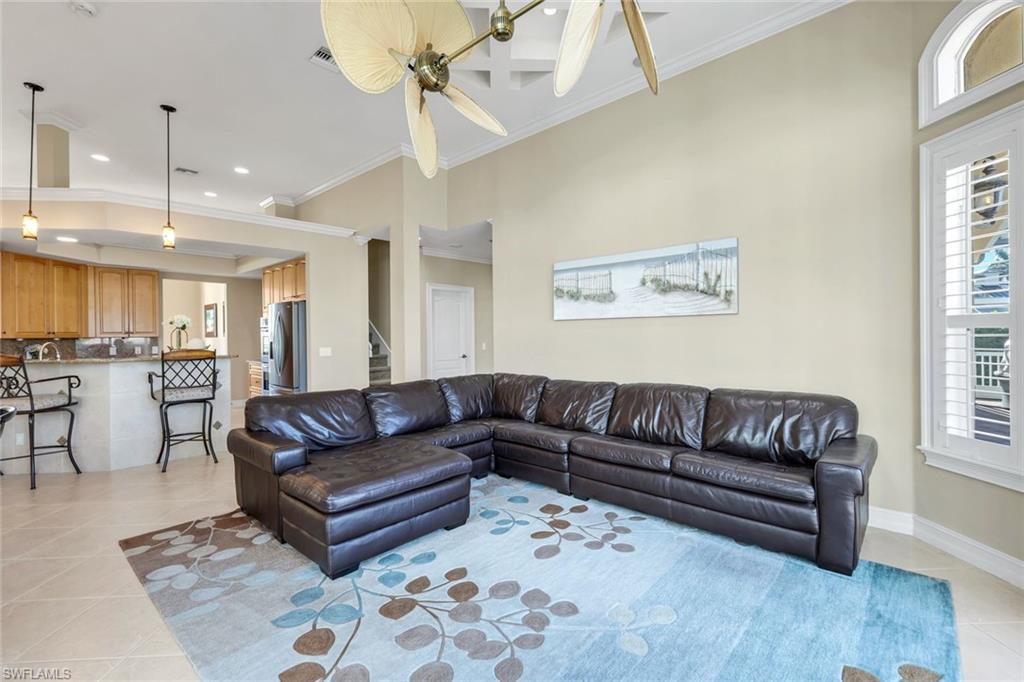 309 Rookery Court Marco Island, FL 34145 - Photo 15 of 49 a view of a living room a rug and a window