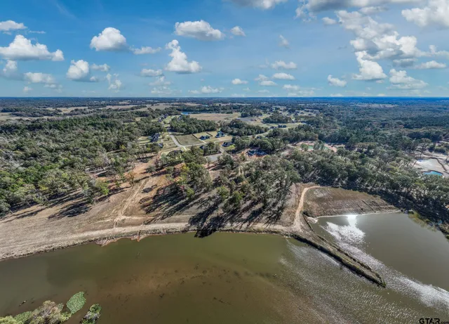 an aerial view of residential building with parking space