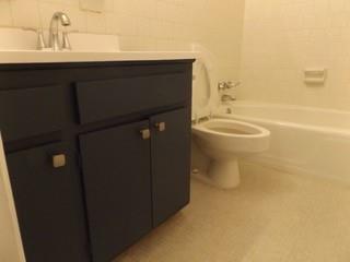 139 East Hill Street Decatur, GA 30030 - Photo 4 of 15 a bathroom with a sink toilet and shower