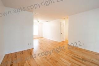 139 East Hill Street Decatur, GA 30030 - Photo 6 of 15 a view of empty room with wooden floor