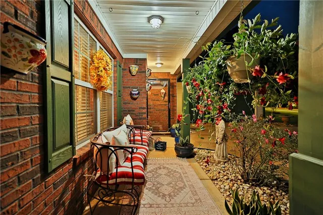 a kitchen with stainless steel appliances granite countertop a refrigerator stove and sink