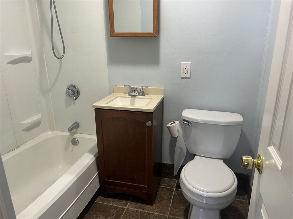 14 Monument Square, Unit 26 Boston, MA 02129 - Photo 7 of 7 a bathroom with a sink and toilet