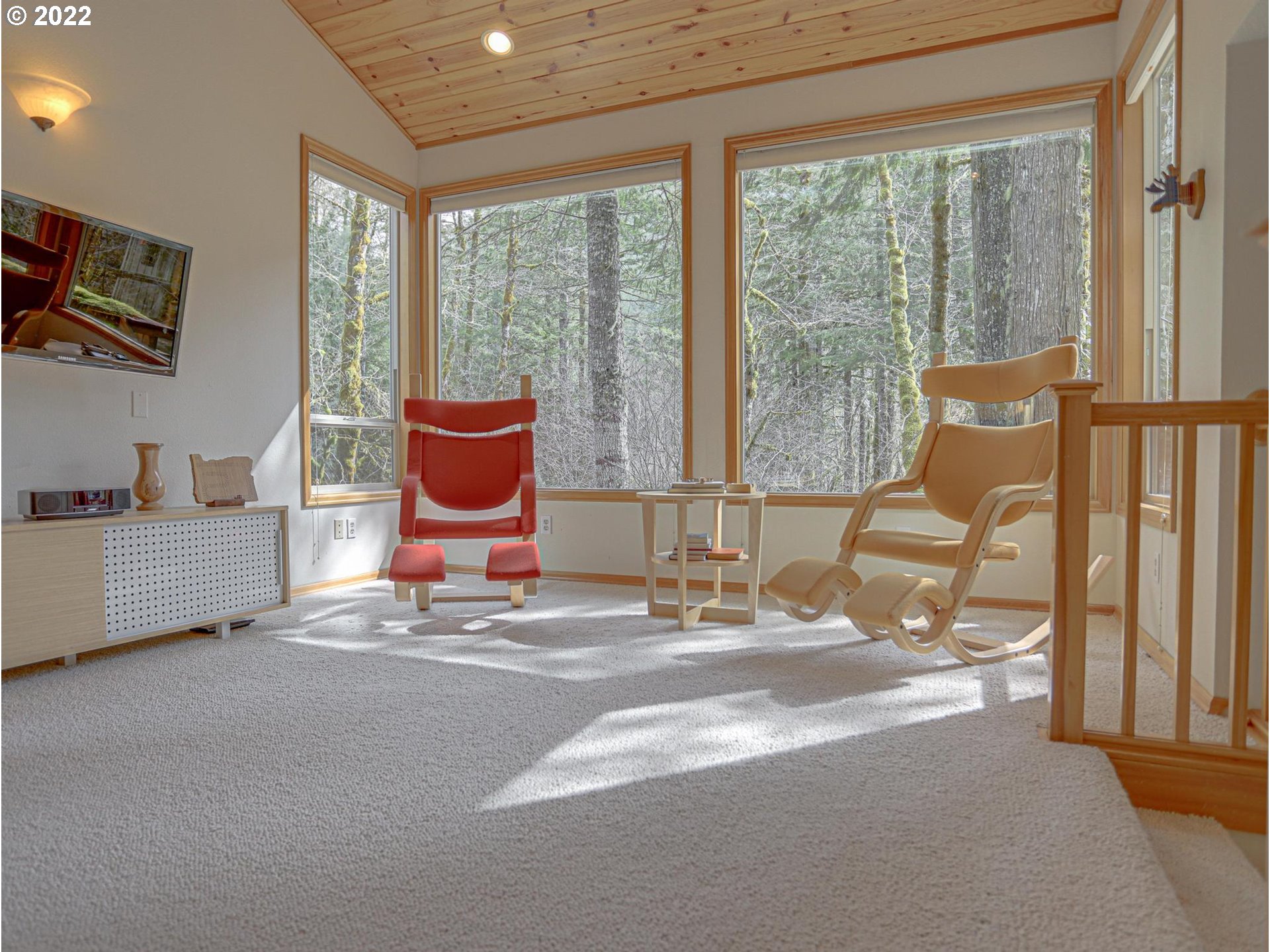 73000 East Village Loop Road Rhododendron, OR 97049 - Photo 12 of 32 a room with furniture and a floor to ceiling window
