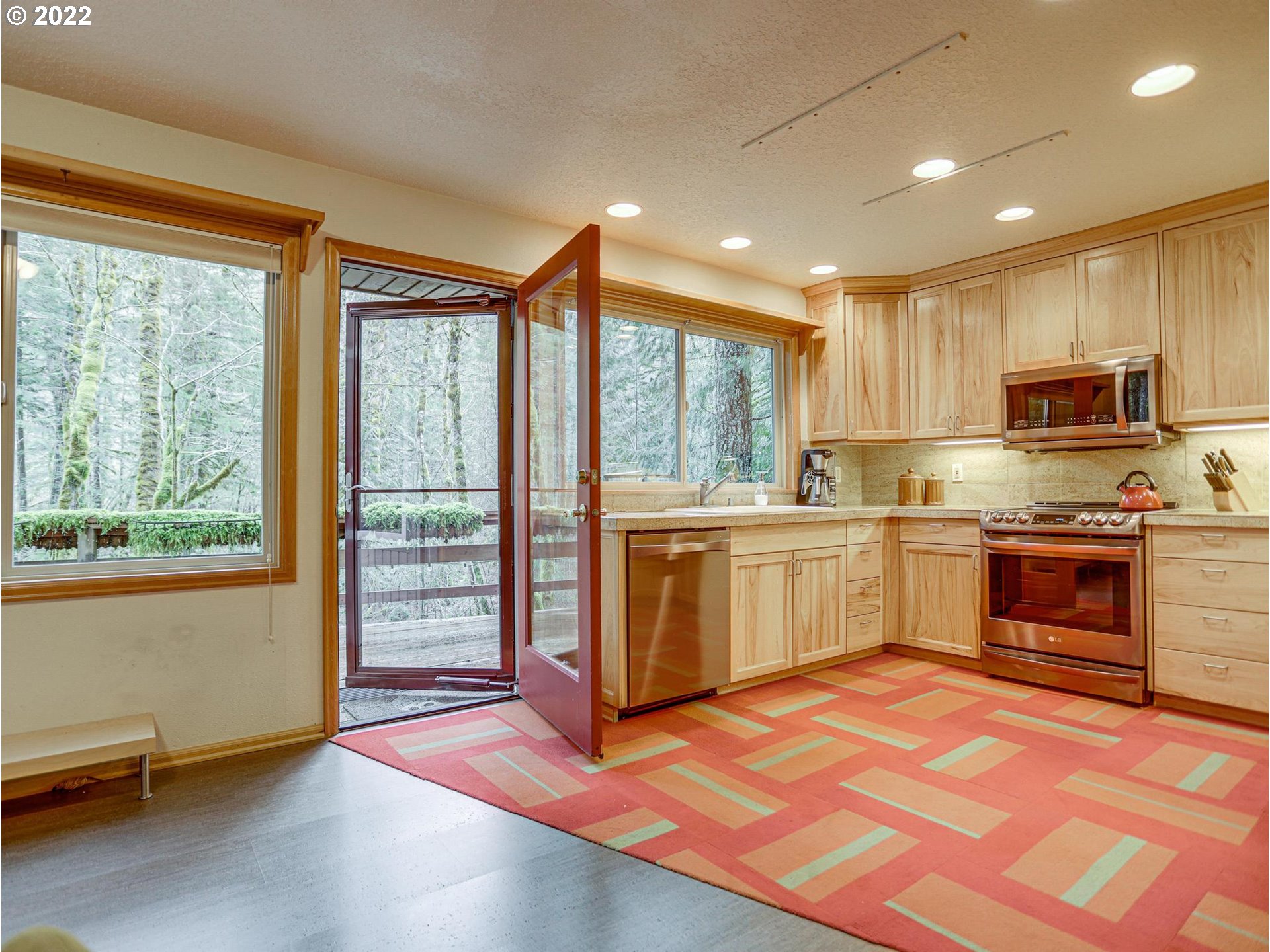 73000 East Village Loop Road Rhododendron, OR 97049 - Photo 15 of 32 a kitchen with a stove a sink and a microwave