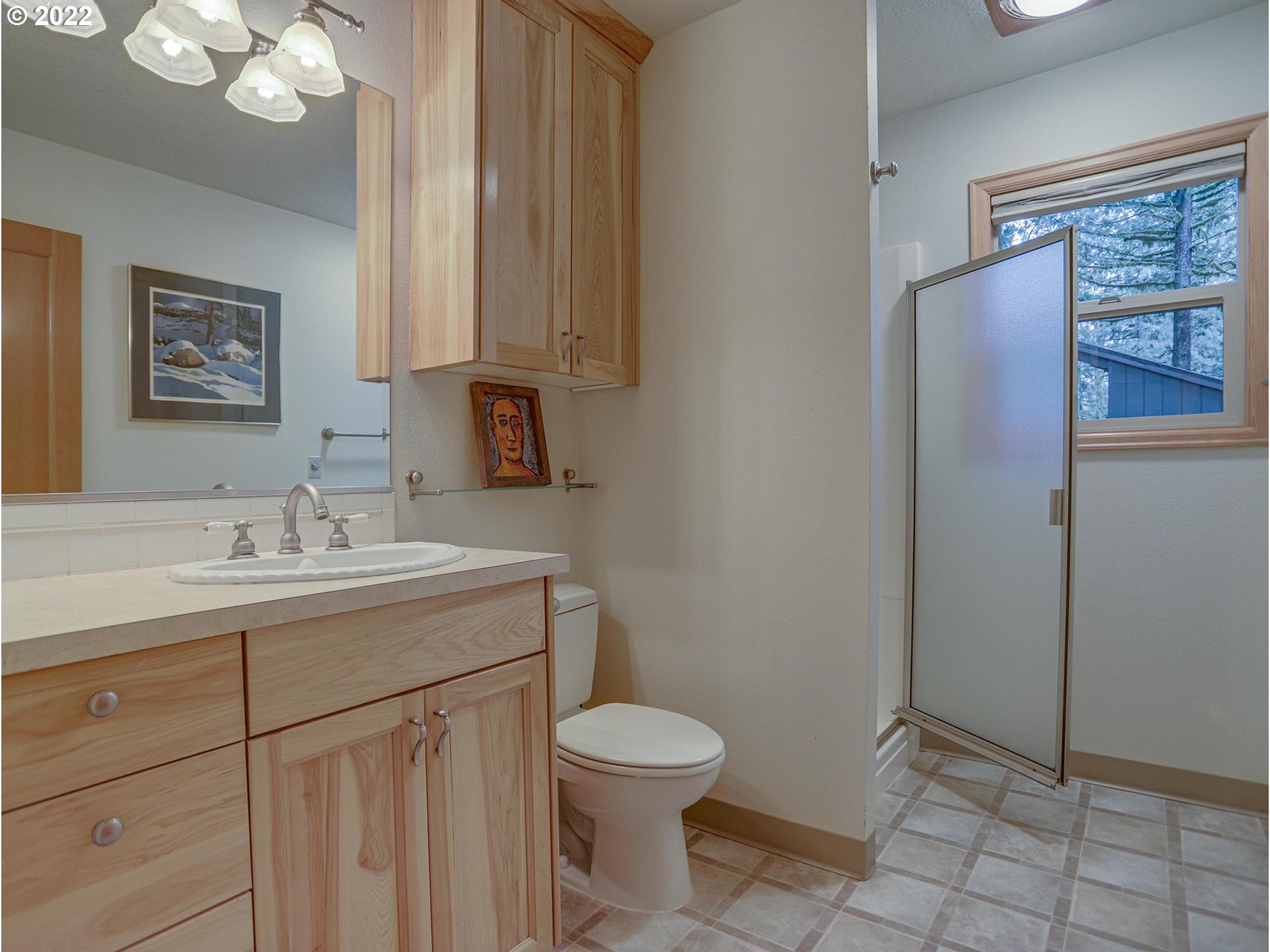 73000 East Village Loop Road Rhododendron, OR 97049 - Photo 20 of 32 a bathroom with a toilet a sink and mirror
