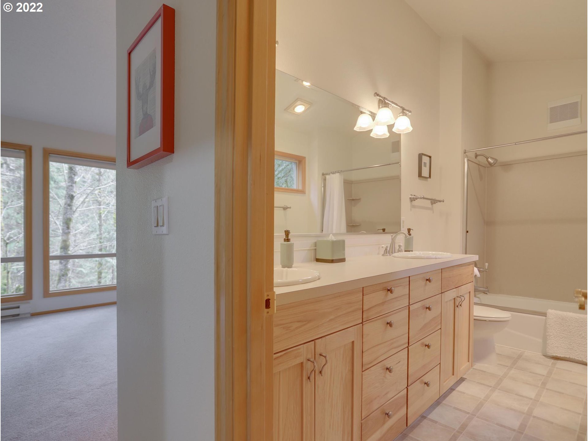 73000 East Village Loop Road Rhododendron, OR 97049 - Photo 26 of 32 a bathroom with a double vanity sink and a mirror