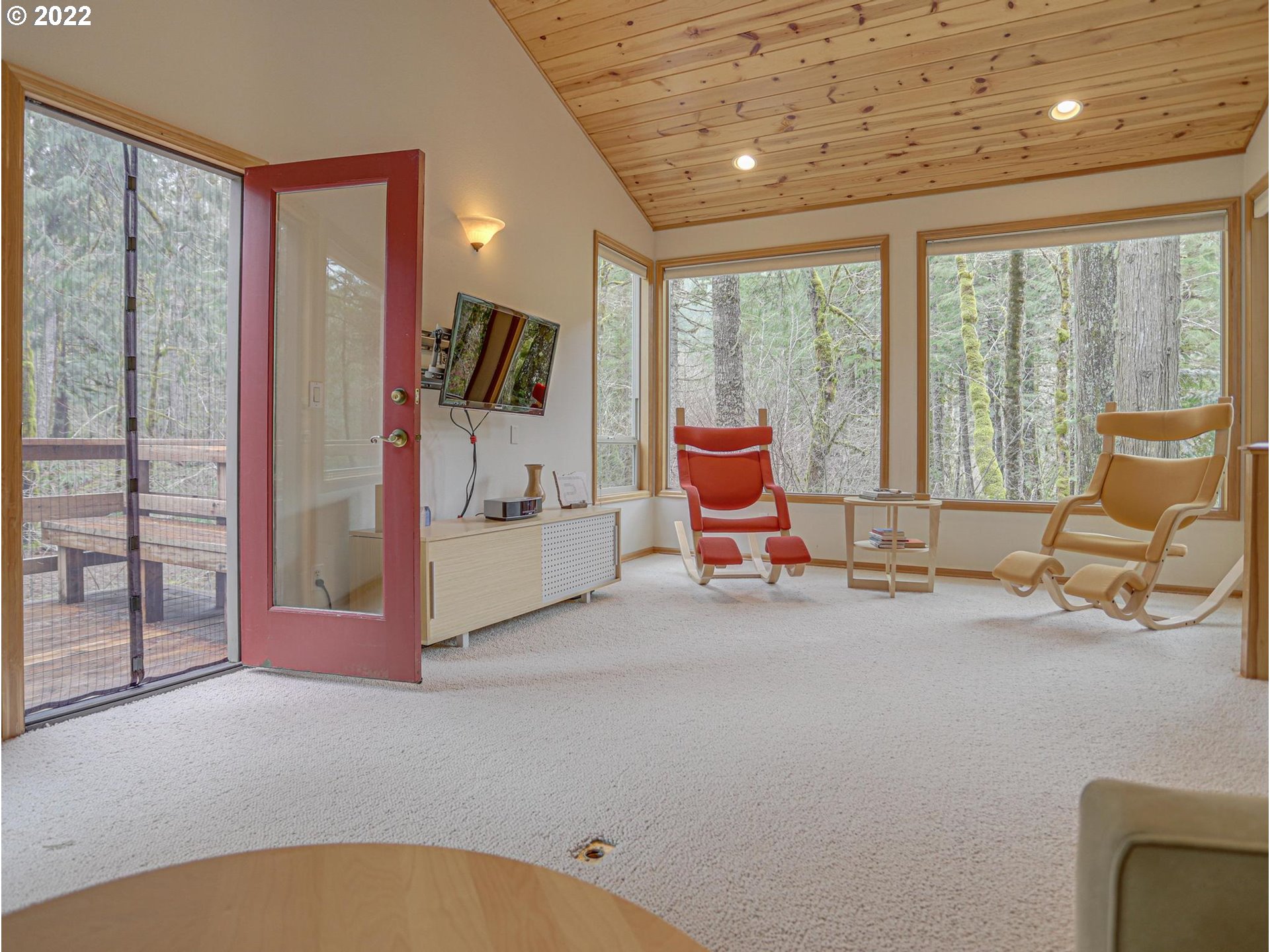 73000 East Village Loop Road Rhododendron, OR 97049 - Photo 4 of 32 a view of a livingroom with furniture and windows