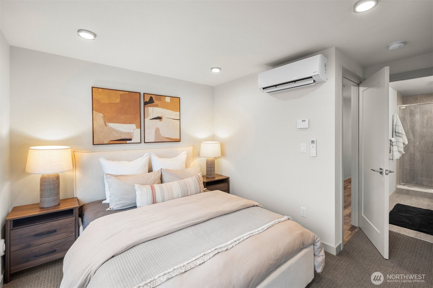 728 North 43rd Street Seattle, WA 98103 - Photo 17 of 29 a bedroom with a bed and a lamp