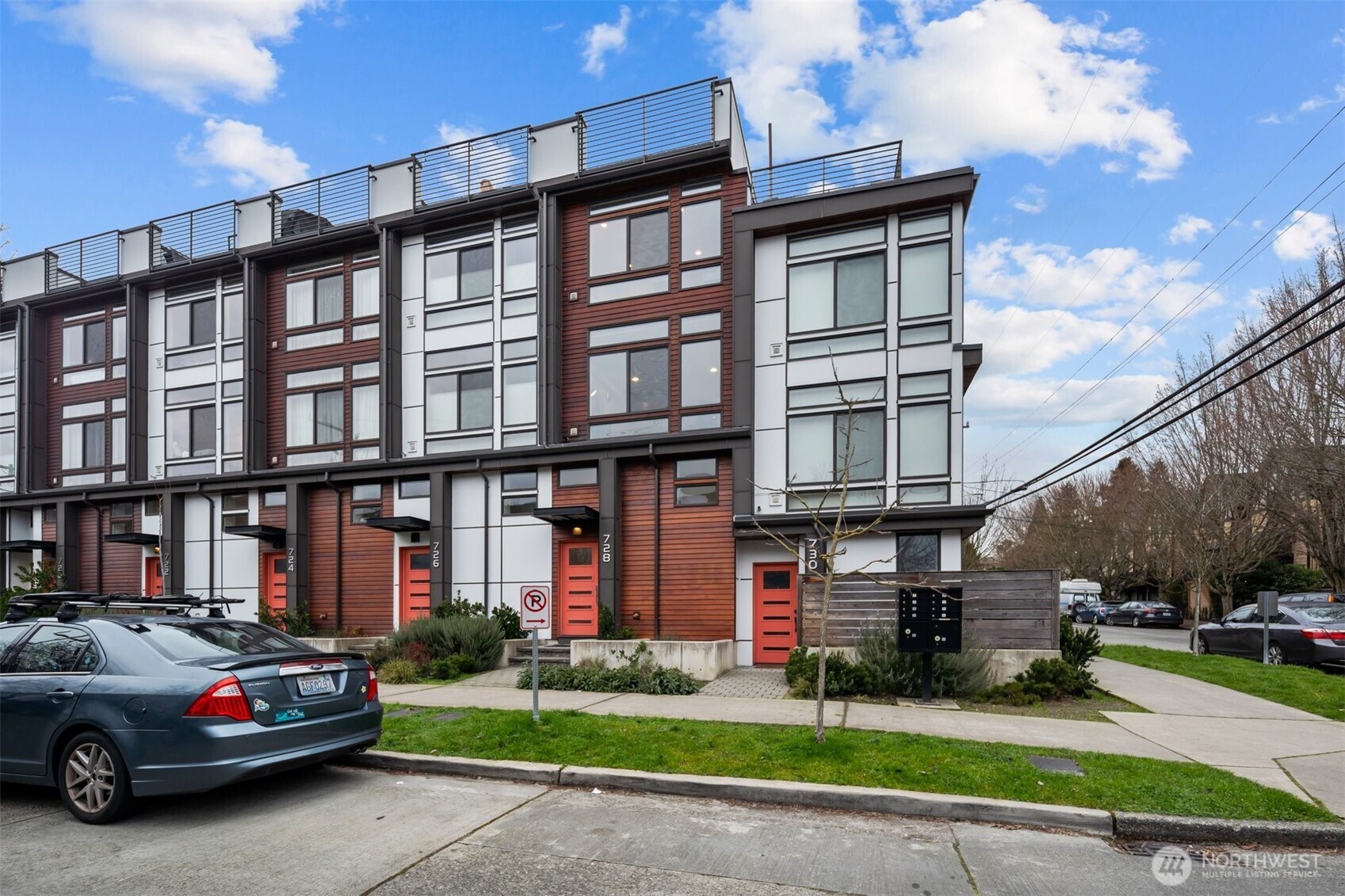 728 North 43rd Street Seattle, WA 98103 - Photo 25 of 29 a car parked in front of a white building
