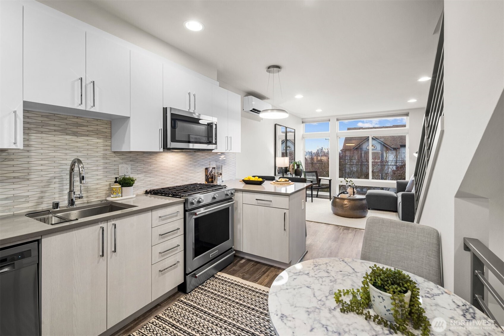 728 North 43rd Street Seattle, WA 98103 - Photo 3 of 29 a kitchen with sink cabinets and appliances
