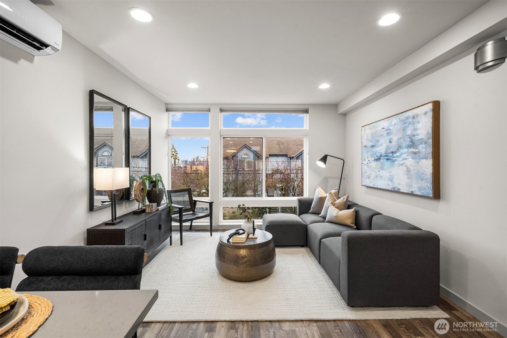 728 North 43rd Street Seattle, WA 98103 - Photo 4 of 29 a living room with furniture and a large window