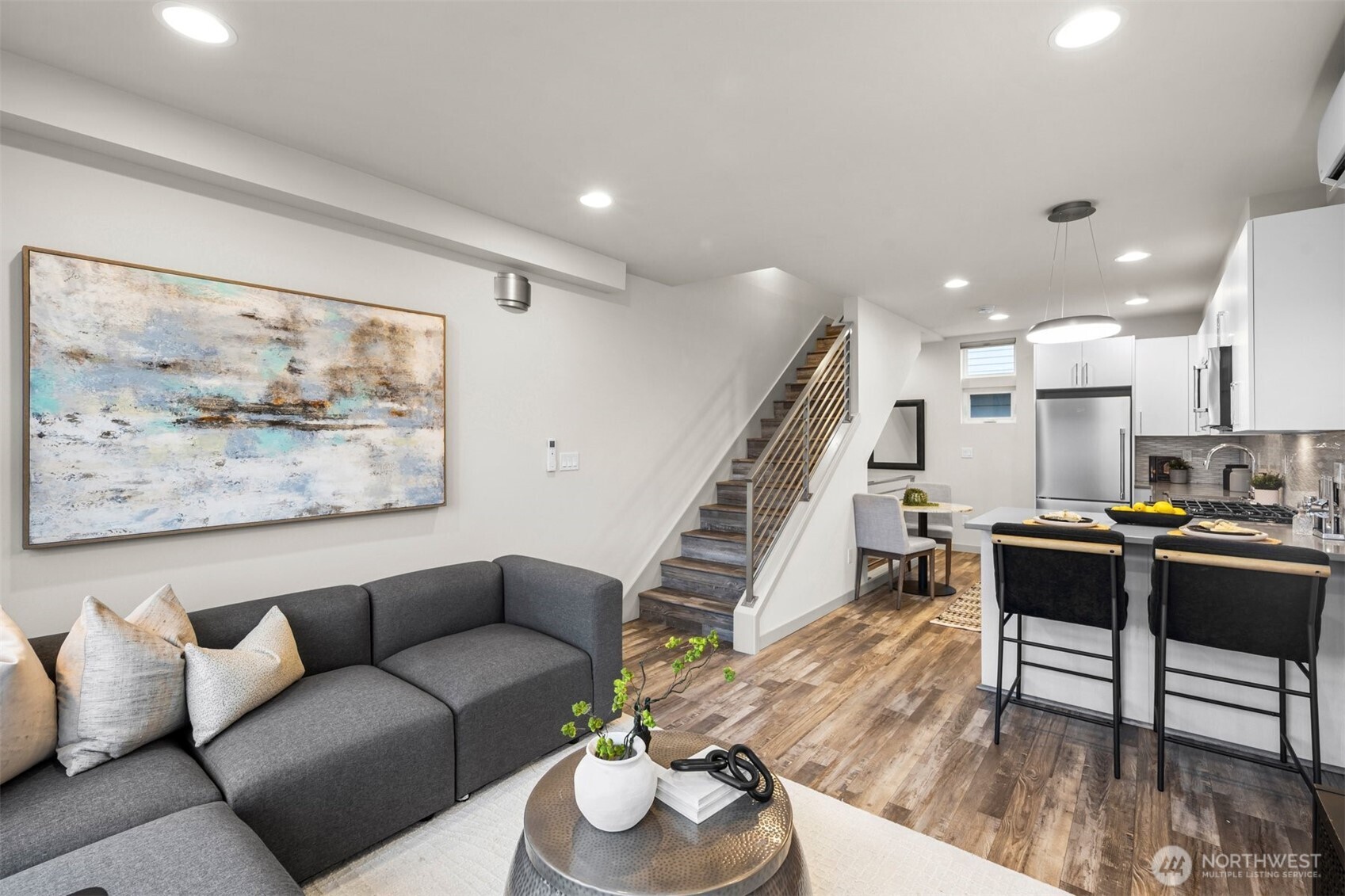 728 North 43rd Street Seattle, WA 98103 - Photo 7 of 29 a living room with furniture and wooden floor