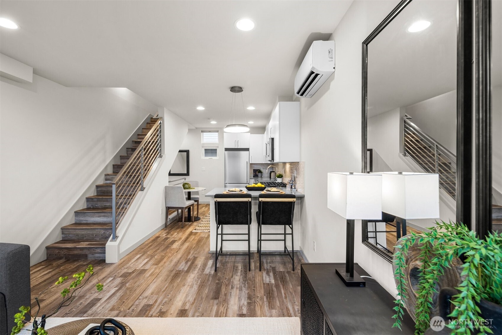 728 North 43rd Street Seattle, WA 98103 - Photo 8 of 29 a living room with furniture and a wooden floor