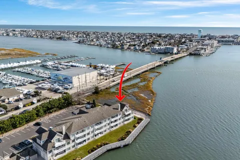 an aerial view of beach and residential space